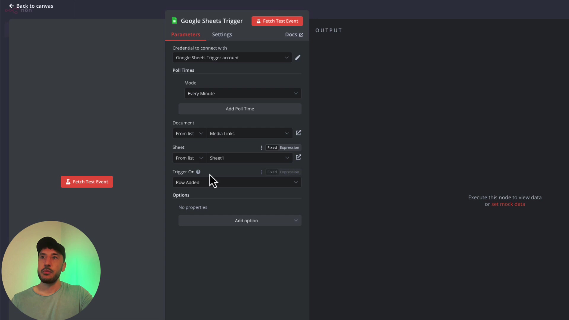 The image displays the configuration panel for a 'Google Sheets Trigger' node within a workflow automation tool, likely n8n. The panel has tabs for 'Parameters', 'Settings', and 'Docs', with 'Parameters' currently selected. Key settings visible include 'Credential to connect with' (Google Sheets account), 'Poll Times' (Every Minute), 'Document' (Media Links), 'Sheet' (Sheet1), and 'Trigger On' (Row Added). There's a 'Fetch Test Event' button at the top right. A male presenter is visible in the bottom left corner, looking towards the right side of the screen, with a green circular highlight around his head.