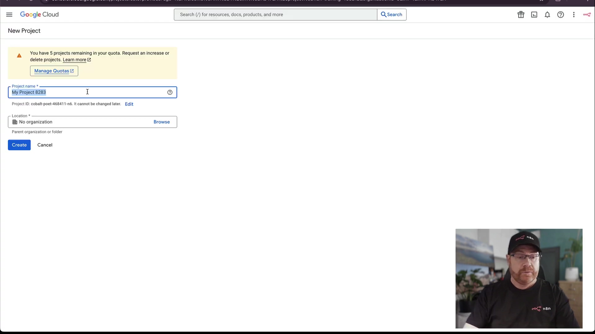 The image displays the 'New Project' page within the Google Cloud console. A yellow banner at the top warns, 'You have 5 projects remaining in your quota. Request an increase or delete projects. Learn more'. Below this, there's a 'Project name' input field pre-filled with 'My Project 8283' and a 'Project ID' field showing 'Project ID: cobalt-post-466411-eb. Edit'. A 'Location' section indicates 'No organization' with a 'Browse' button. At the bottom left, 'Create' and 'Cancel' buttons are visible. The top bar includes a search field 'Search for resources, docs, products, and more', a search icon, and a profile icon. A man with glasses and a black cap is visible in the bottom right corner, wearing a black t-shirt with a white logo. The interface is predominantly white with blue accents.