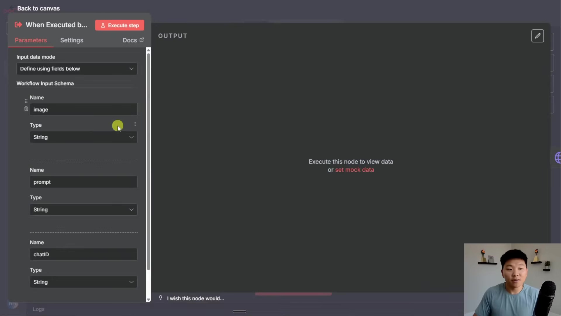 The image displays a software interface, likely n8n, showing the configuration for an 'Execute step' within a workflow. The left panel has tabs for 'Parameters', 'Settings', and 'Docs'. Under 'Parameters', there's an 'Input data mode' dropdown set to "Define using fields below". Below that, a 'Workflow Input Schema' section lists fields: 'Name' (Image), 'Type' (String), 'Name' (prompt), 'Type' (String), 'Name' (chatID), and 'Type' (String). Each field has a dropdown and a three-dot icon for more options. The main central area is labeled 'OUTPUT' and contains a message "Execute this node to view data or set mock data". A man with short dark hair and a black t-shirt is visible in the bottom right corner, looking at the screen and talking.