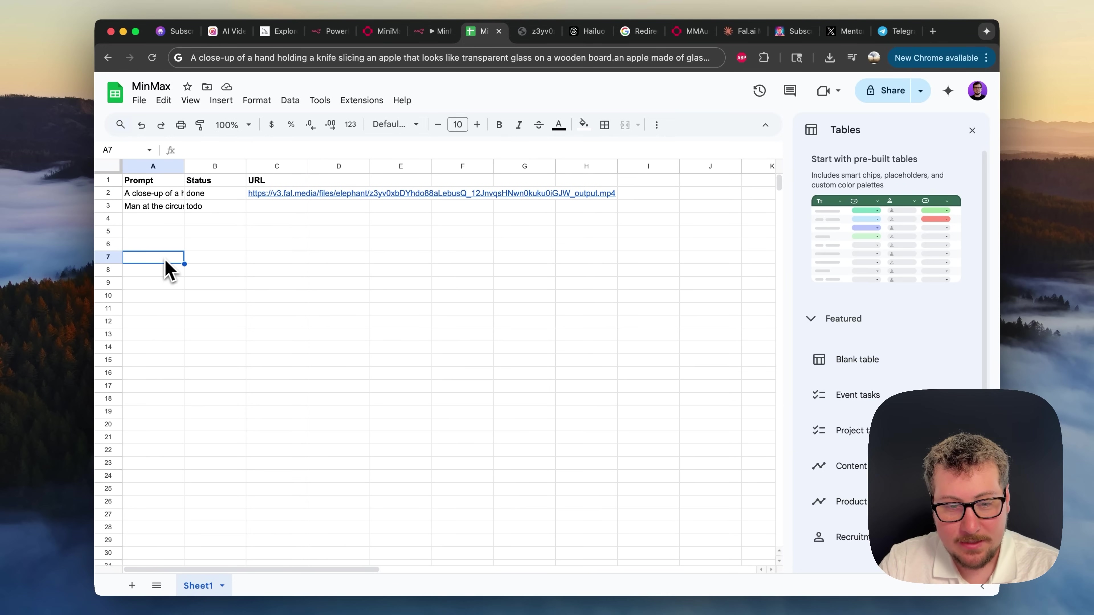 The image displays a Google Sheets interface, likely being used to manage video prompts and URLs. The spreadsheet contains columns for 'Prompt', 'Status', and 'URL'. Row 2 shows a prompt 'A close-up of a done' with a corresponding URL 'https://s3.hailuo.media/files/elephants%2FdyhD0Bbal.ebuaQ_12.hvrqsFNwmKUKuOG_JW_output.mp4'. Row 3 has 'Man at the circuit track'. The sheet is named 'Sheet1'. On the right sidebar, there's a 'Tables' section with options to 'Start with pre-built tables' and 'Custom color palettes', and a 'Featured' section with 'Blank table' and 'Event tasks'. The interface is clean and white, typical of Google Sheets. A person's face is visible in the bottom right corner, looking at the screen.