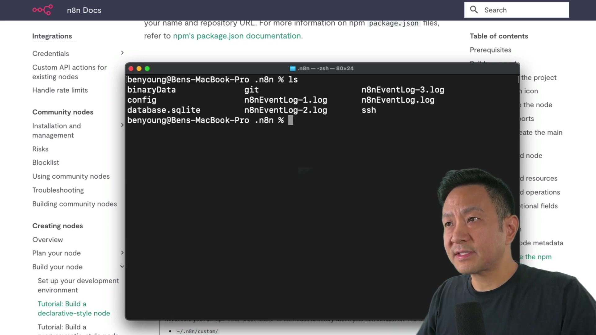 The image shows a person looking at a terminal window on a computer screen. The terminal displays a directory listing with files such as 'binaryData', 'config', 'database.sqlite', 'n8nEventLog-1.log', 'n8nEventLog-2.log', 'n8nEventLog-3.log', and 'ssh'. The person is positioned to the right of the screen, partially visible. The background includes elements of the n8n Docs interface, such as 'Integrations', 'Credentials', 'Custom API actions for existing nodes', 'Handle rate limits', 'Community nodes', 'Installation and management', 'Risks', 'Blocklist', 'Using community nodes', 'Troubleshooting', 'Building community nodes', 'Creating nodes', 'Overview', 'Plan your node', 'Build your node', 'Set up your development environment', 'Tutorial: Build a declarative-style node', and a search bar.