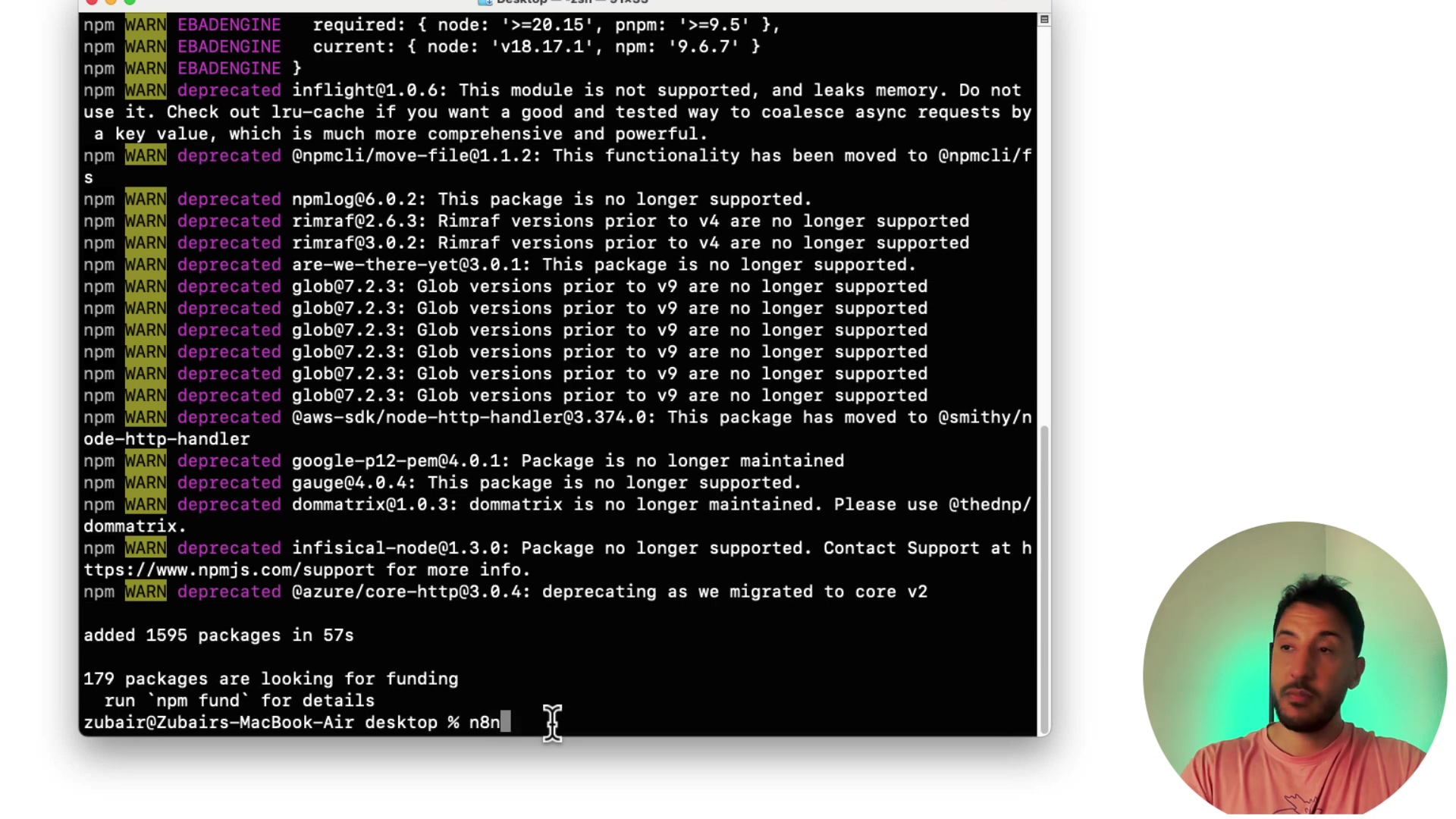 Terminal displaying npm installation warnings and summary