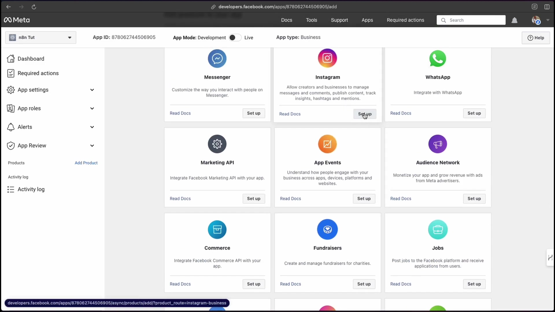 The image displays the Meta for Developers dashboard, showing various app products available for integration. The main section is a grid of cards, each representing a Meta product like Messenger, Instagram, WhatsApp, Marketing API, App Events, Audience Network, Commerce, Fundraisers, and Jobs. The Instagram card is highlighted with a 'Set up' button, indicating it's the focus. A sidebar on the left lists navigation options such as 'Dashboard', 'Required actions', 'App settings', 'App roles', 'Alerts', 'App Review', 'Products', 'Activity log'. The top bar includes 'App ID', 'App Mode: Development', 'Live', 'App type: Business', and navigation links like 'Docs', 'Tools', 'Support', 'Apps', 'Required actions', and a search bar.