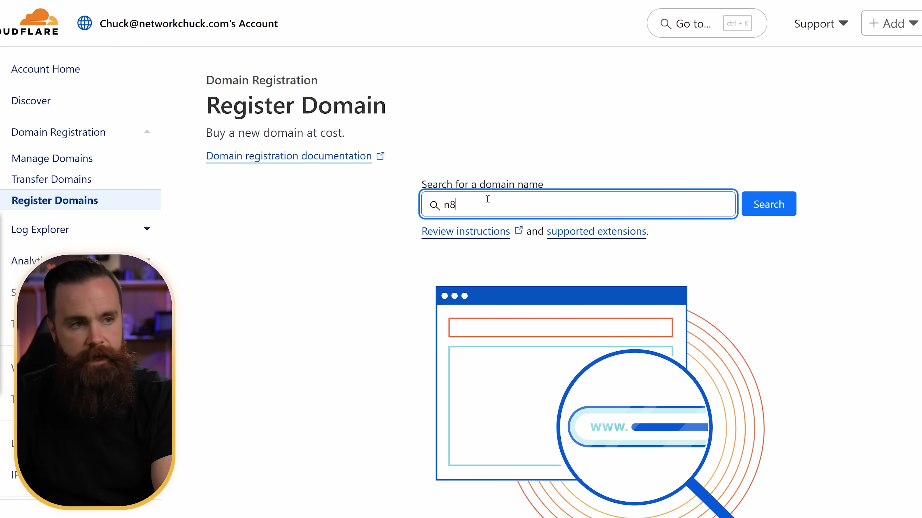 The image displays a screenshot of the Cloudflare dashboard interface for 'Domain Registration'. A man with a beard is visible in the bottom-left corner, seemingly observing the screen. The main section of the interface shows 'Register Domain' with a subtitle 'Buy a new domain at cost.' Below this, there's a search bar labeled 'Search for a domain name' with 'n8' already typed in, and a 'Search' button. A link 'Domain registration documentation' is also visible. On the right side, there's a graphical representation of a browser window with 'WWW.' highlighted, suggesting a domain name. The left sidebar shows navigation options like 'Account Home', 'Discover', 'Domain Registration', 'Manage Domains', 'Transfer Domains', and 'Register Domains' is highlighted.